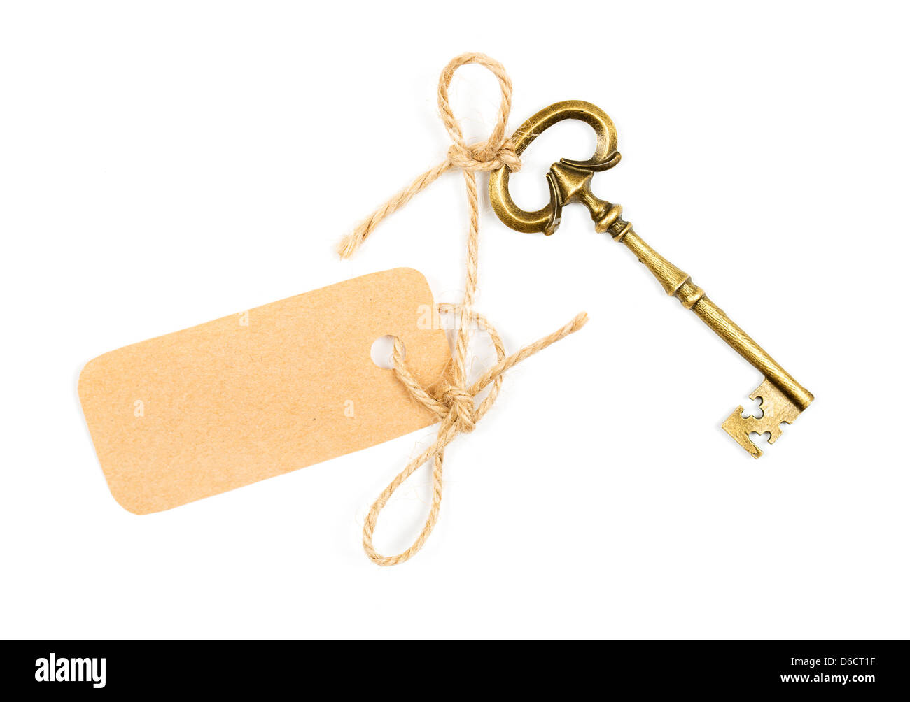 Vintage Schlüssel mit einem Tag für den Text auf weiß Stockfoto