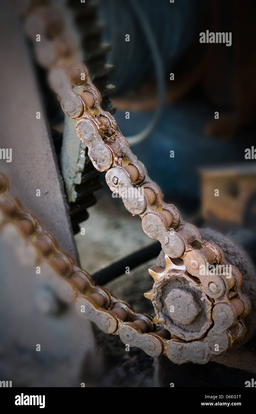 schmierige Kette und Zahnrad Stockfoto