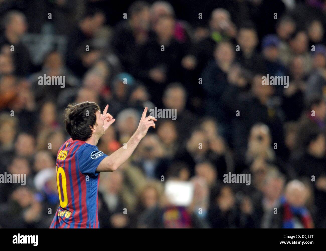 Barcelonas Lionel Messi feiert während der Champions League von sechzehn zweiten Bein-Fußballspiel zwischen FC Barcelona und Bayer Leverkusen im Nou Camp Stadion in Barcelona, Nordost-Spanien, 7. März 2012. Foto: Federico Gambarini dpa Stockfoto