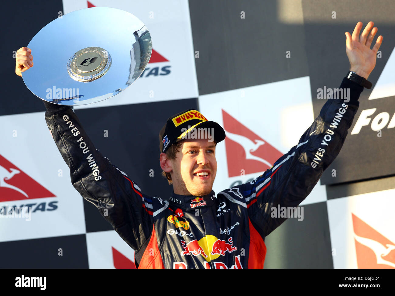 Deutsche Formel1-Fahrer Sebastian Vettel von Red Bull feiert seinen zweiten Platz auf dem Podium nach dem australischen Formel 1 Grand Prix auf dem Albert Park Circuit in Melbourne, Australien, 18. März 2012. Foto: Jens Buettner Dpa +++(c) Dpa - Bildfunk +++ Stockfoto