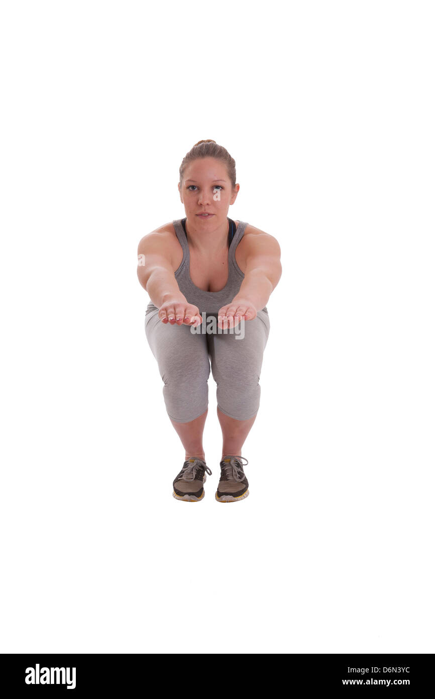 Weibliche Bewegung und Fitness auf weißem Hintergrund. Stockfoto