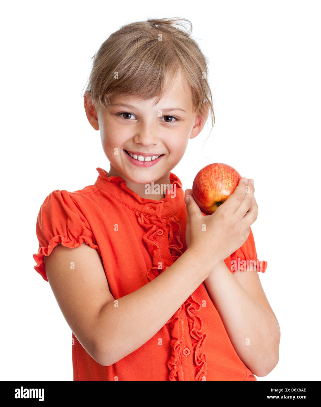 Mädchen essen roten Apfel isoliert Stockfoto