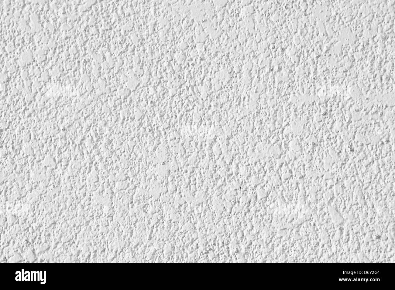 Weißer Farbe bemalte Betonwand Stockfoto