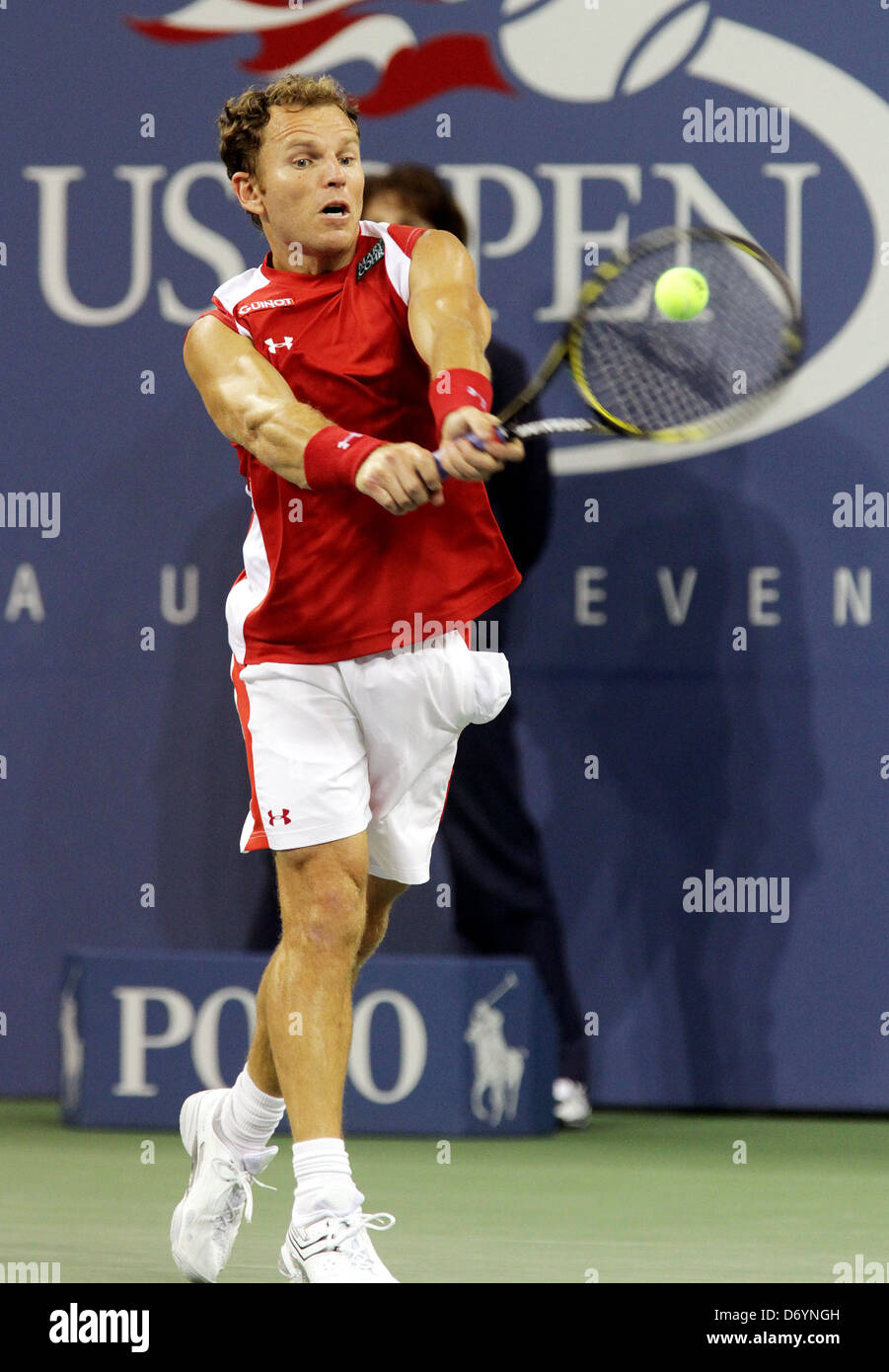 Michael Russell der Vereinigten Staaten spielt gegen Andy Roddick der Vereinigten Staaten während der drei Tage der 2011 US Open am Stockfoto