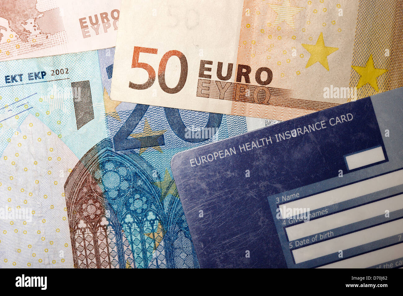 Europäische Krankenversicherung-Karte und Euro-Banknoten Stockfoto