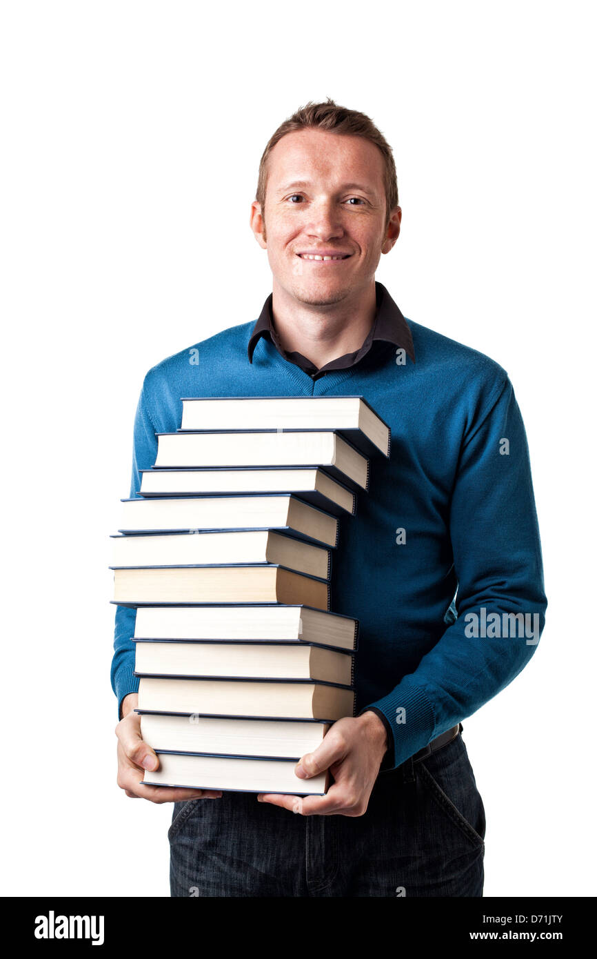 lächelnder Mann mit einem Stapel Bücher Stockfoto