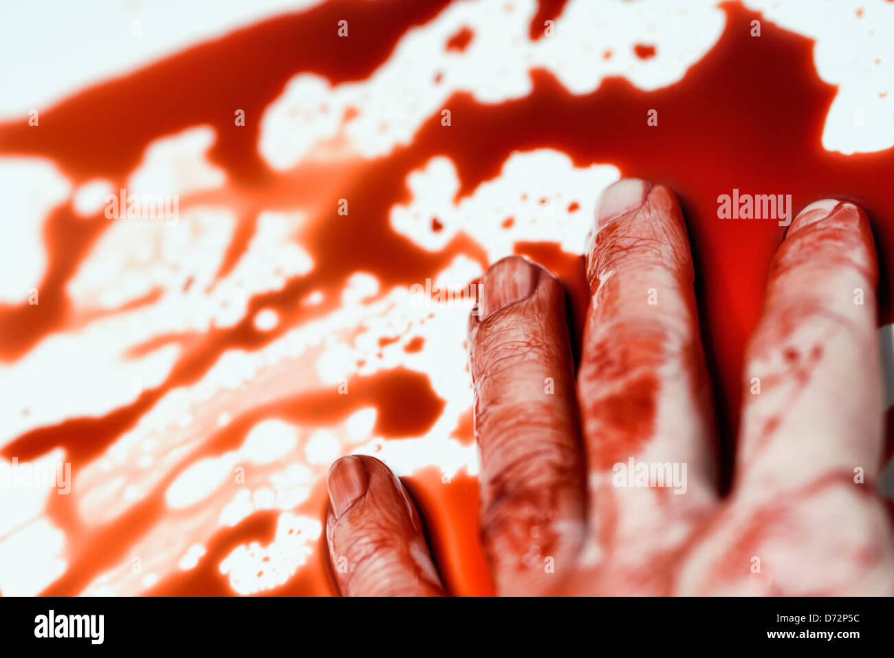 Hand und Blutlache, symbolische Foto macht Stockfoto