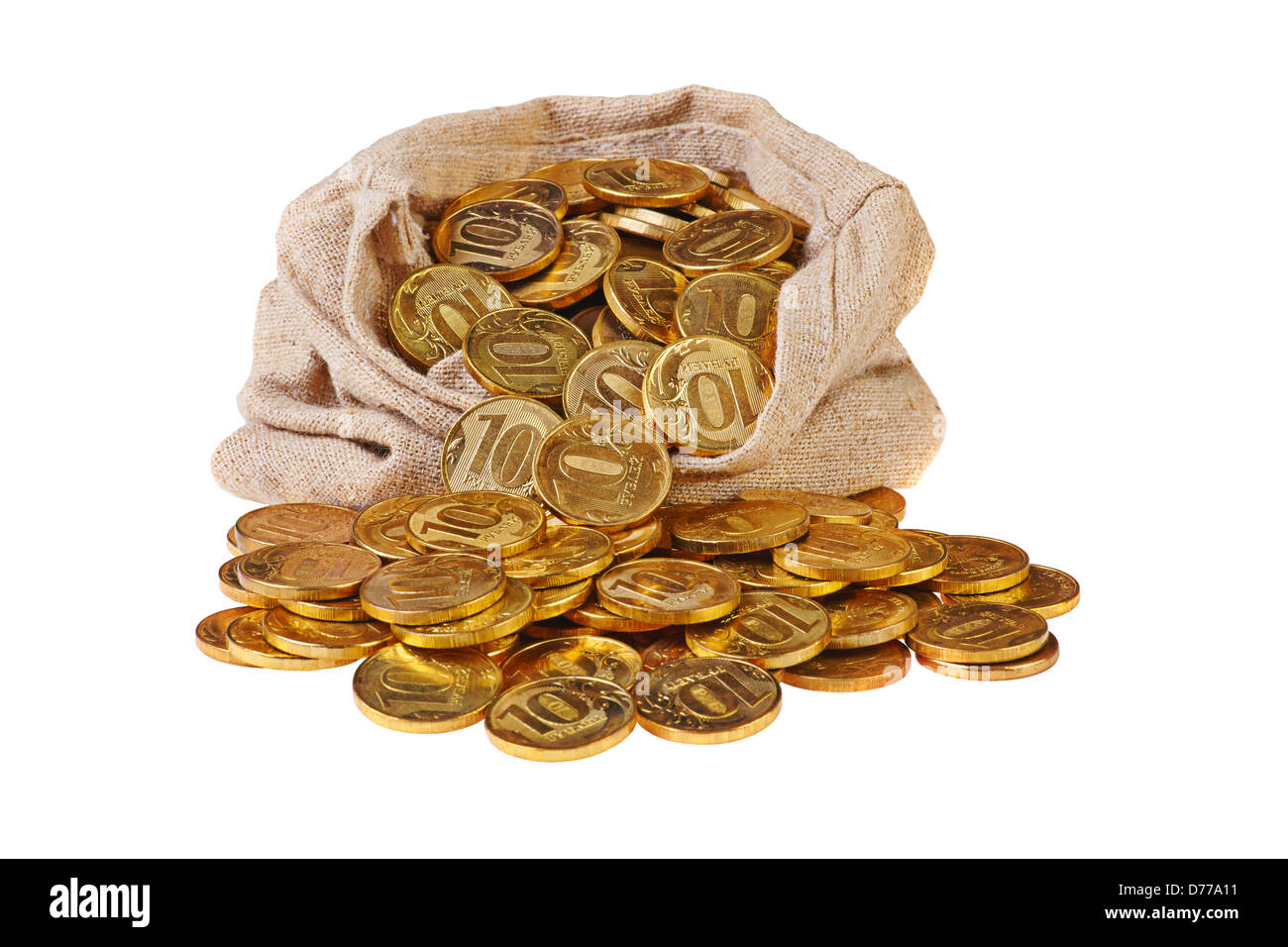 Goldene-Münzen fallen aus einer Segeltuchtasche auf weißem Hintergrund Stockfoto