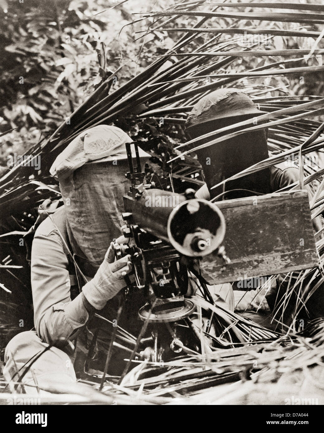 MG-Schütze in Moskitonetz Stockfoto