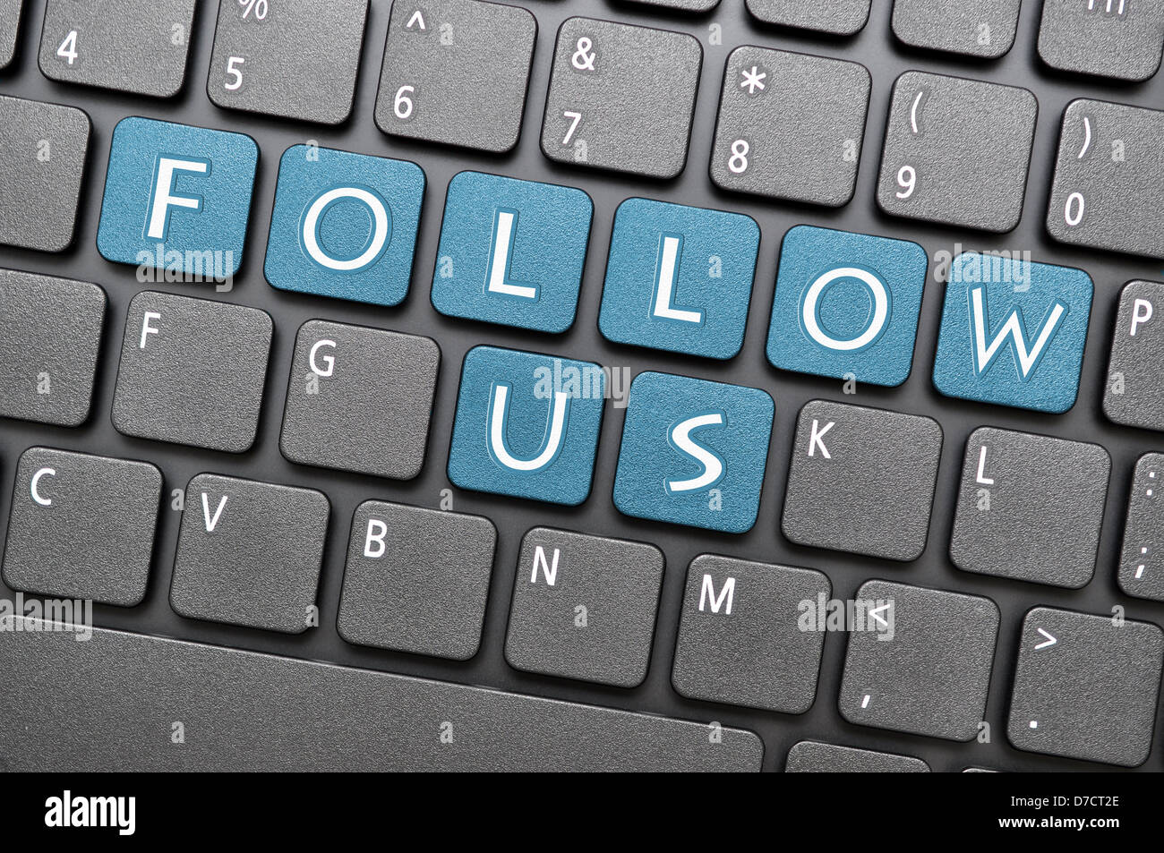 Folgen Sie uns auf der Tastatur Stockfoto