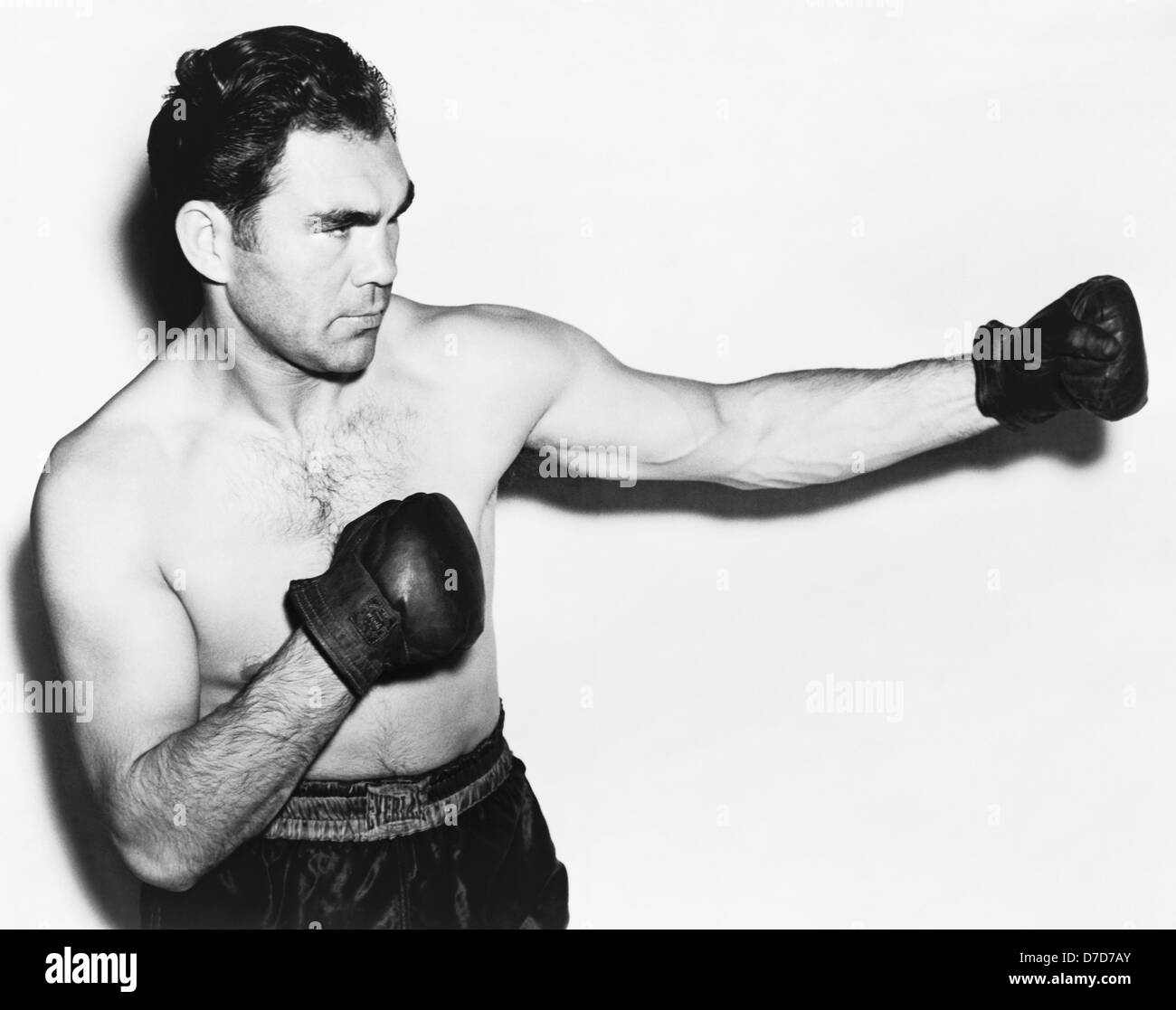 Oldtimer-Foto des deutschen Boxers Max Schmeling (1905 – 2005) – Schmeling, bekannt als „der schwarze Uhlan des Rheins“, war von 1930 bis 1932 Weltmeister im Schwergewicht. Foto ca. 1938. Stockfoto
