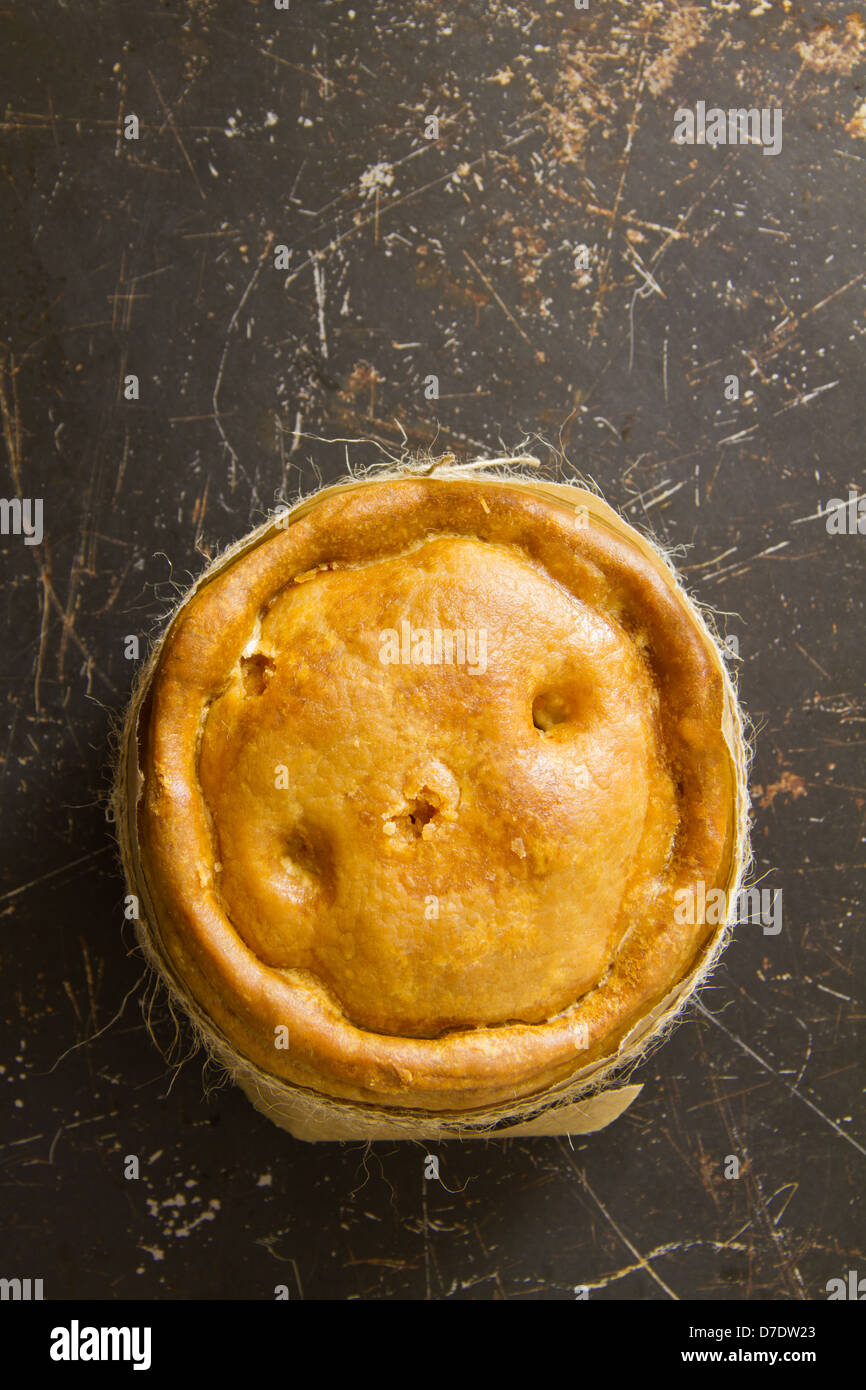 Melton Mowbray Pork Pie auf notleidende Metall Stockfoto