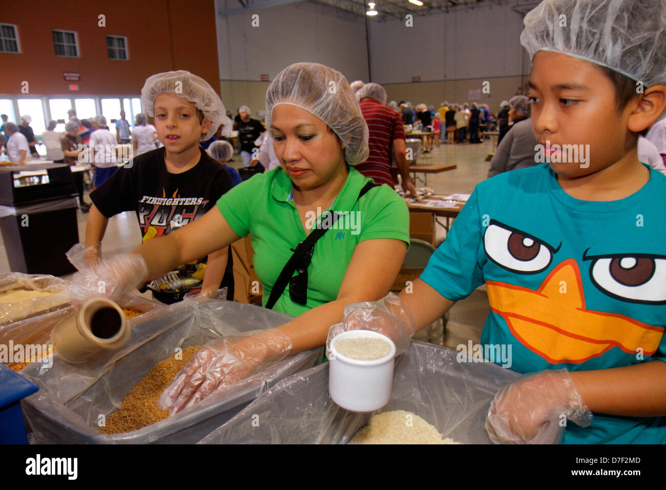 Miami Florida, Miami Dade County Fair und Expo, Feed My Hungving Children, Freiwillige Freiwillige Community Service ehrenamtliche Arbeit Arbeiter, teamwo Stockfoto