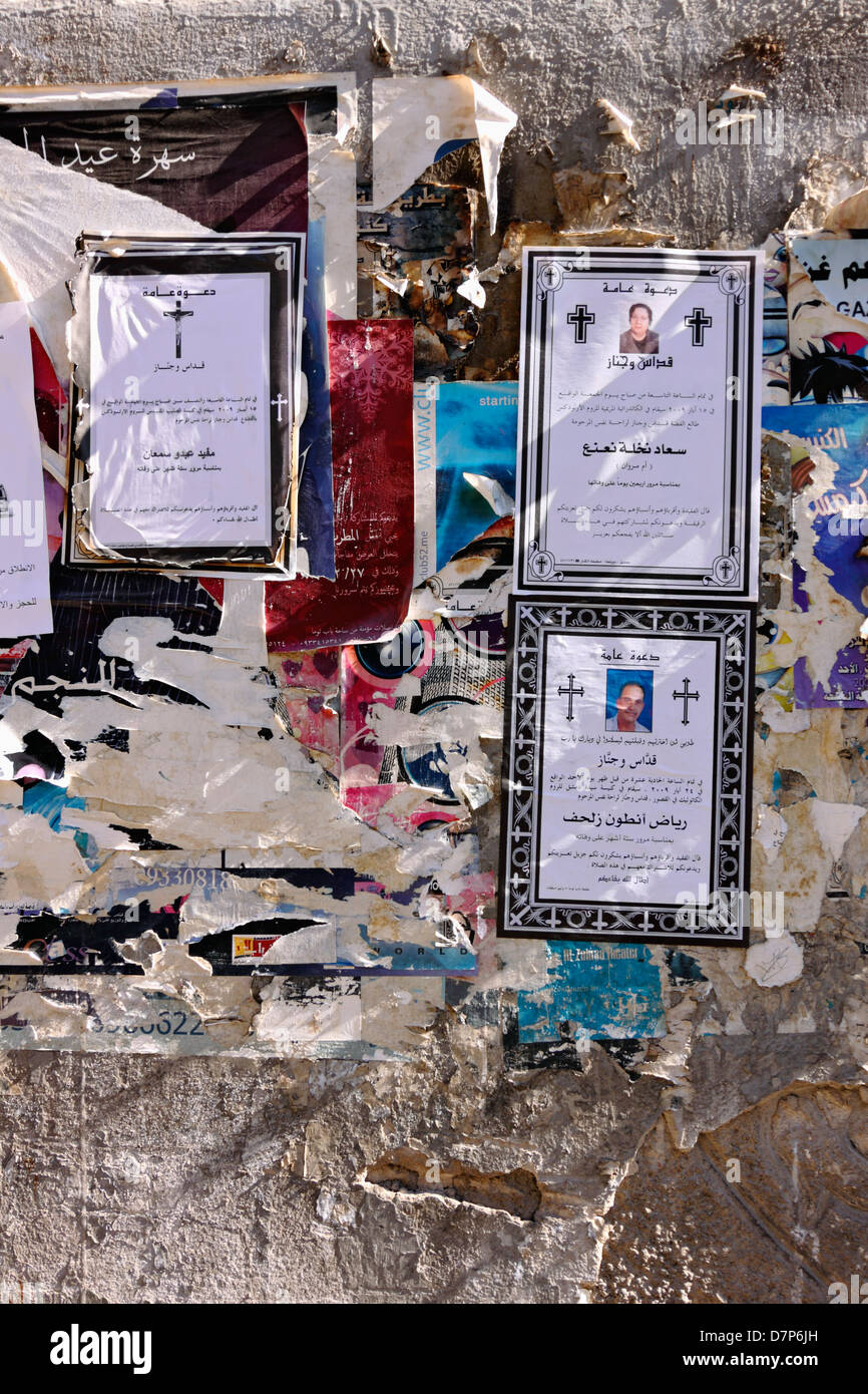 Christlichen Todesanzeigen an der Wand einer Straße von Damaskus, Syrien Stockfoto