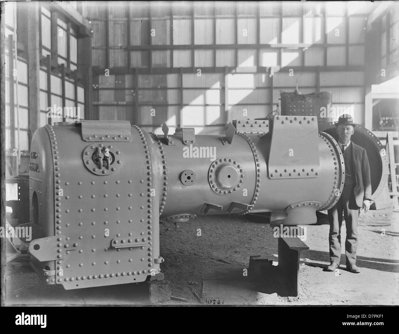 Mann mit Clyde fahrbare Dampfmaschine Stockfoto