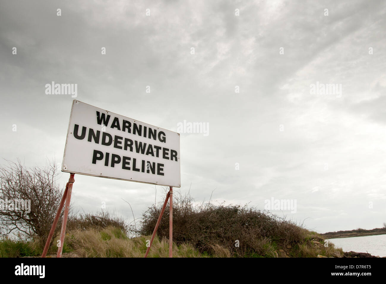 Unterwasser-Pipeline Warnschild Stockfoto