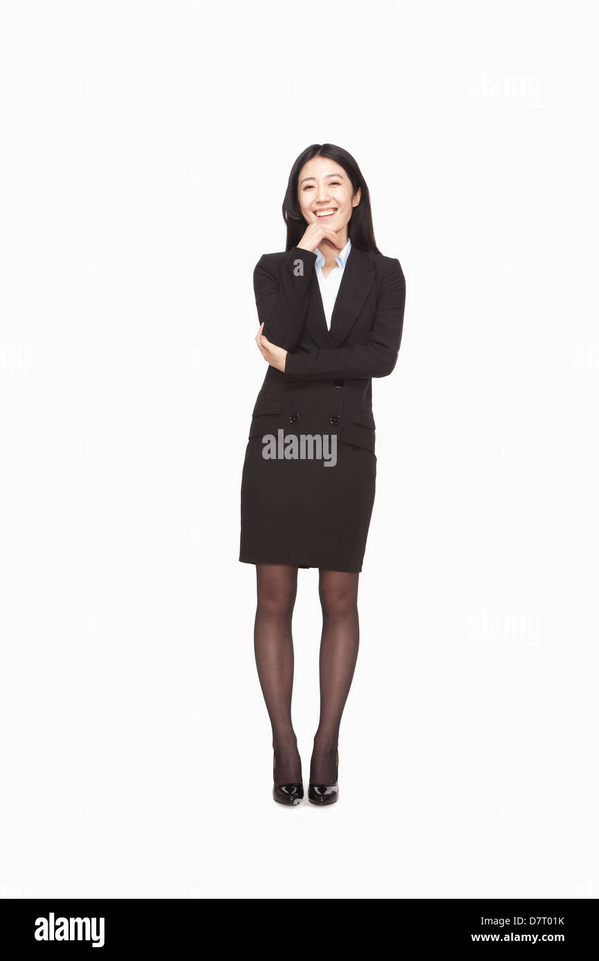 Geschäftsfrau, die lächelnd Stockfoto