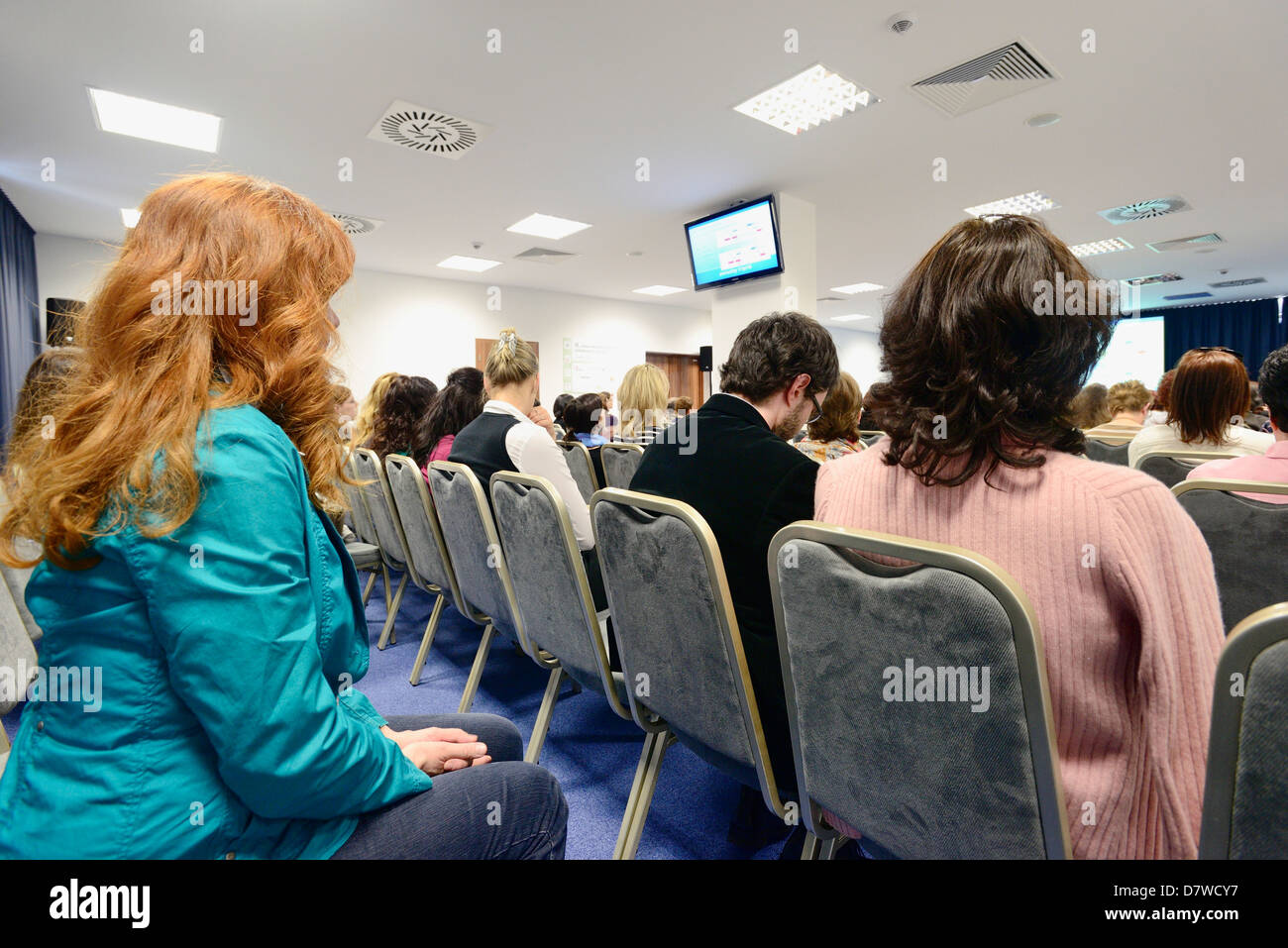 Publikum hören während einer professionellen Präsentation Stockfoto