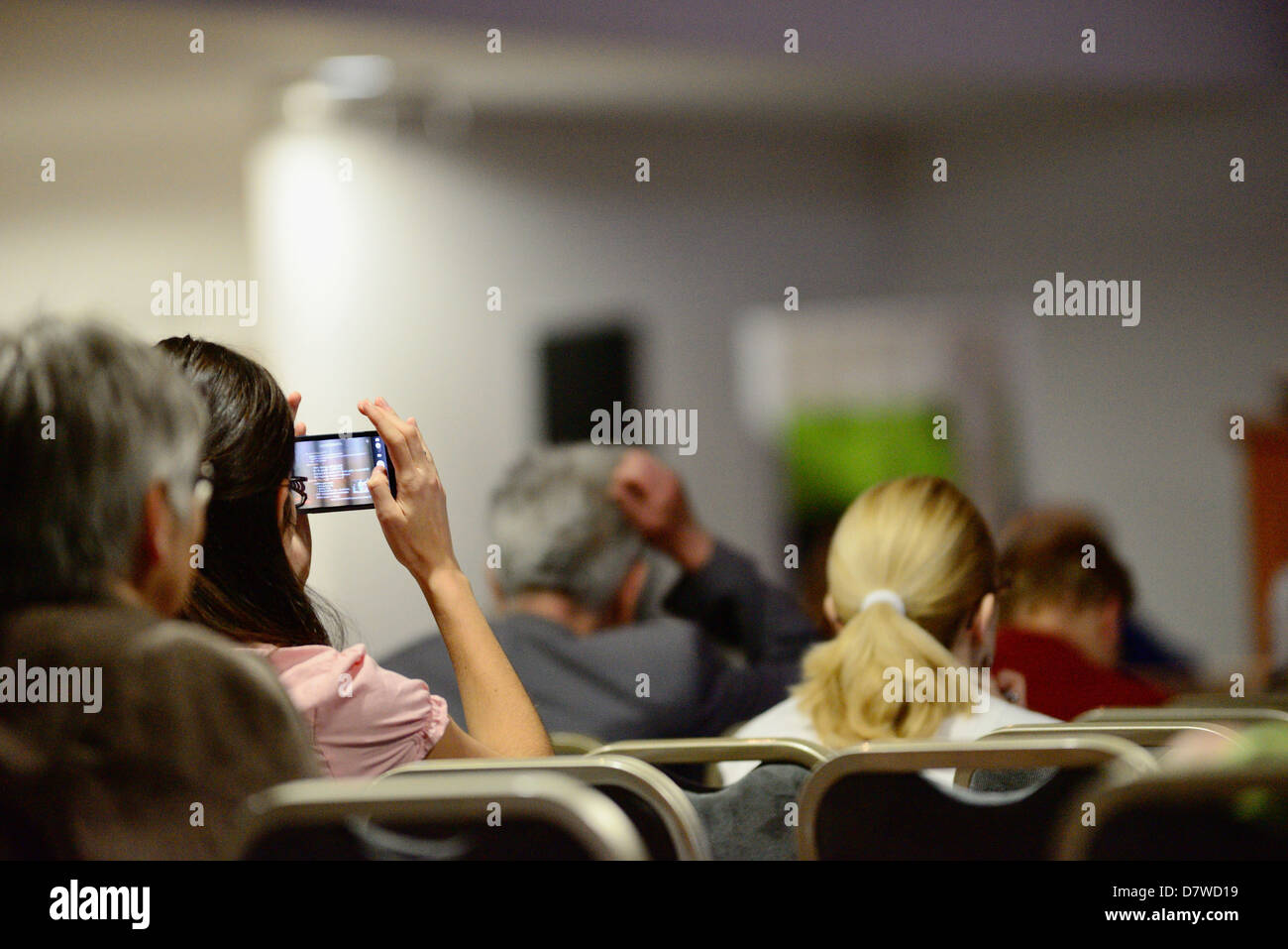 Publikum hören während einer professionellen Präsentation Stockfoto