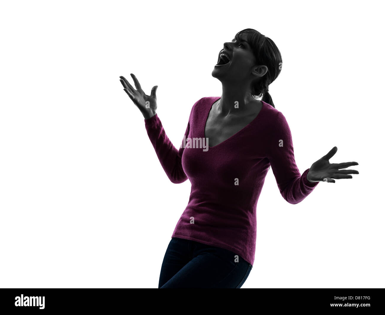 eine Frau glücklich überrascht blickte Porträt im Silhouette Studio isoliert auf weißem Hintergrund Stockfoto