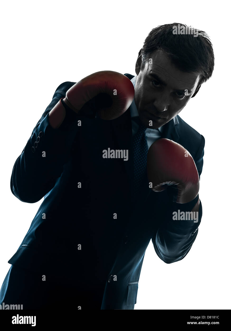 ein Geschäftsmann mit Boxhandschuhen Silhouette Studio isoliert auf weißem Hintergrund Stockfoto