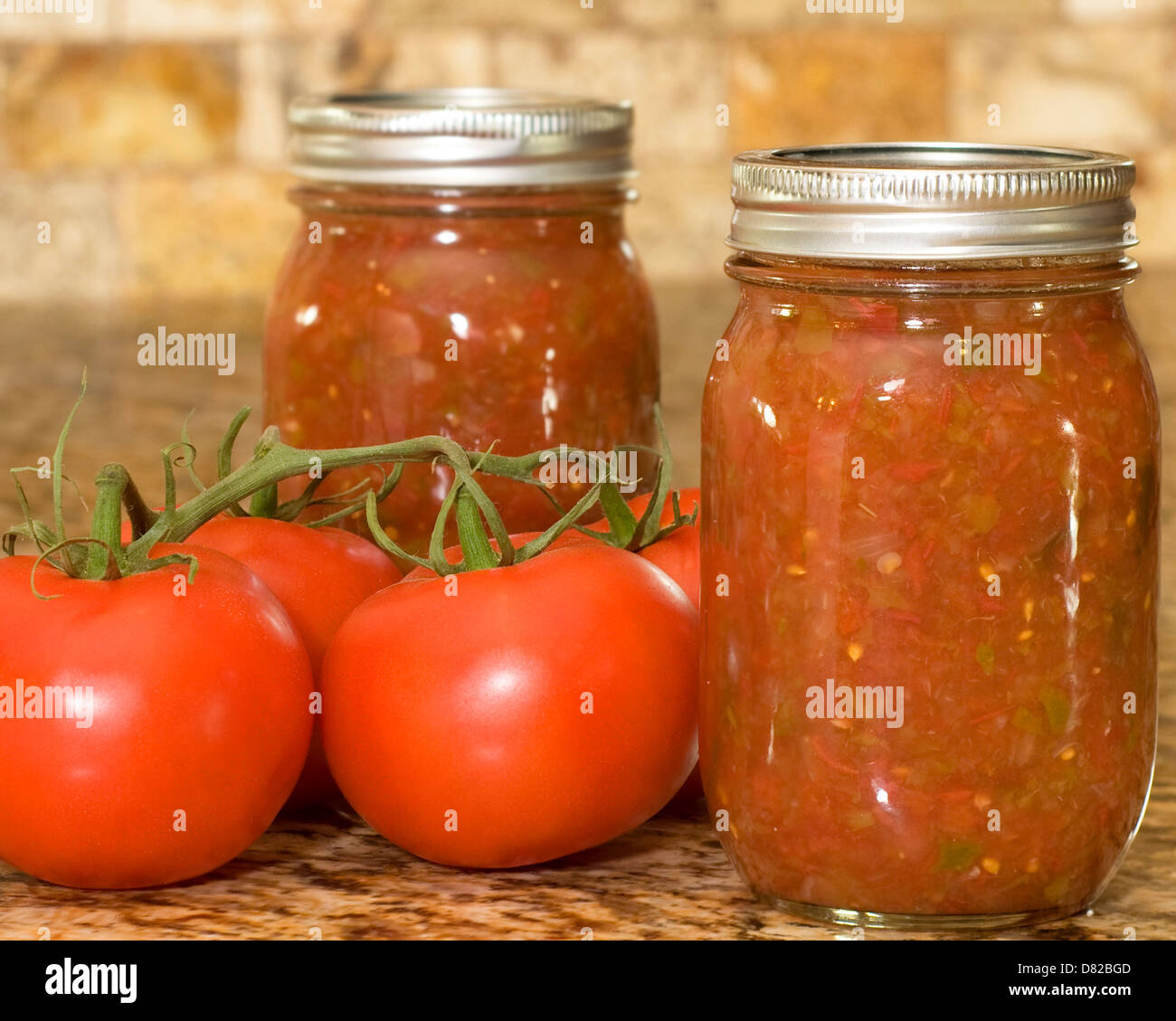 Nahaufnahme von Home Made Salsa und Tomaten Stockfoto