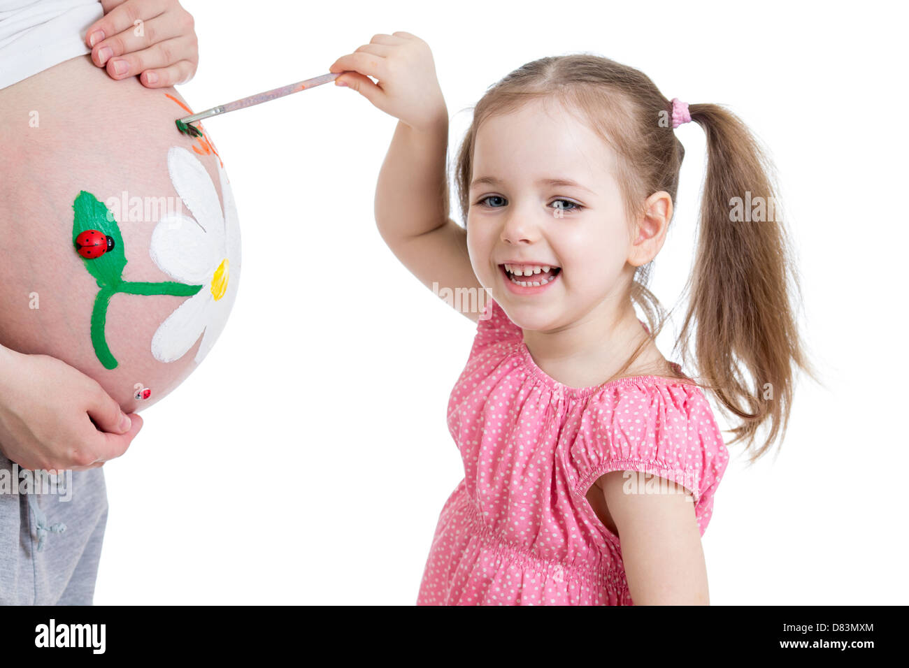 süßes Kind Mädchen Malerei Mutters Bauch Stockfoto
