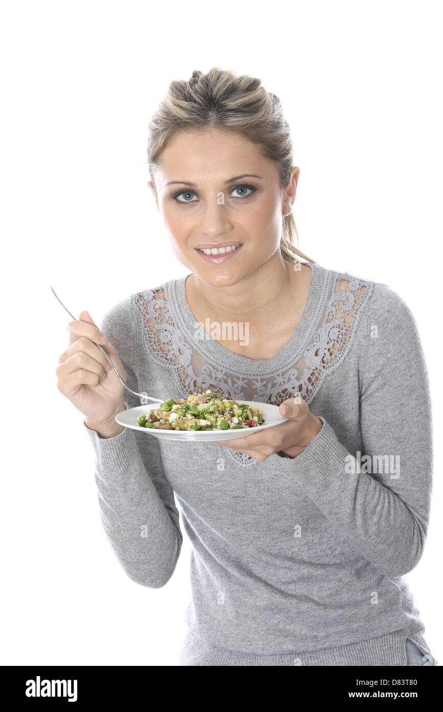 Junge Frau eine Gesunde vegetarische oder vegane Super Essen Salat gegen einen weißen Hintergrund mit einen Freistellungspfad isoliert Stockfoto