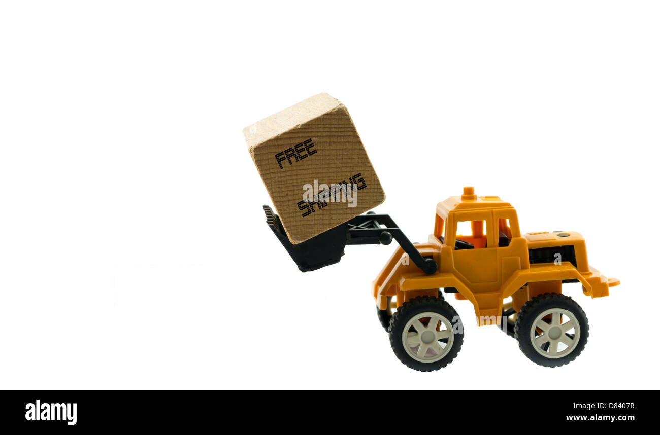 gelbe Bagger mit kostenlosem Versand text Stockfoto