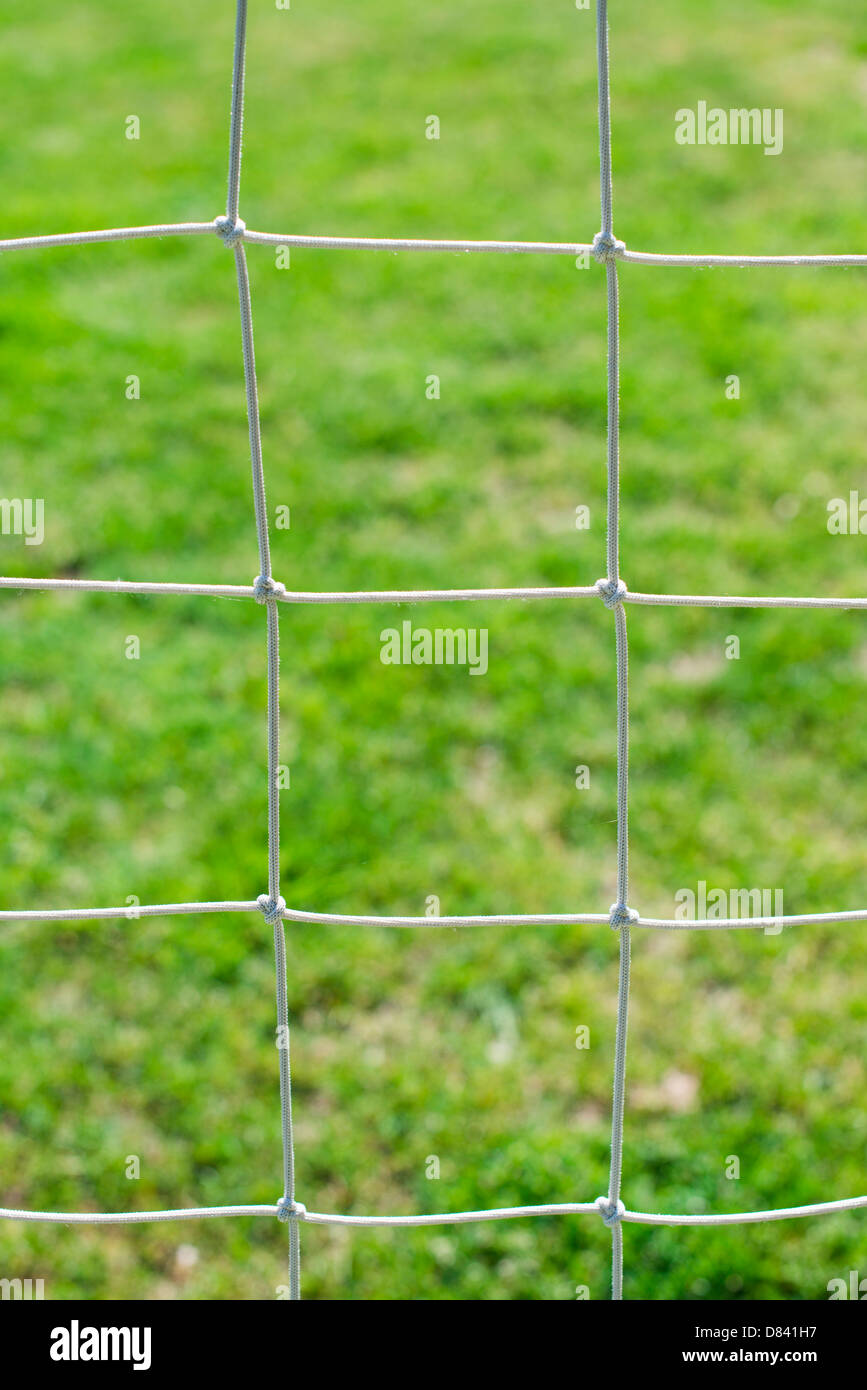 Fußball Netto und grasgrün Hintergrund Stockfoto