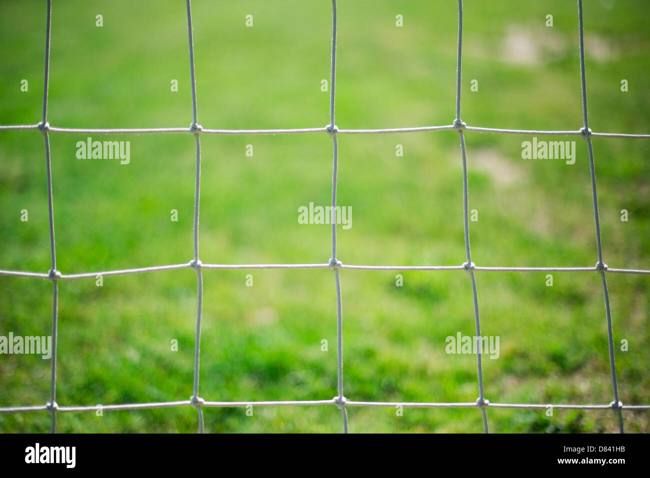 Fußball Netto und grasgrün Hintergrund Stockfoto