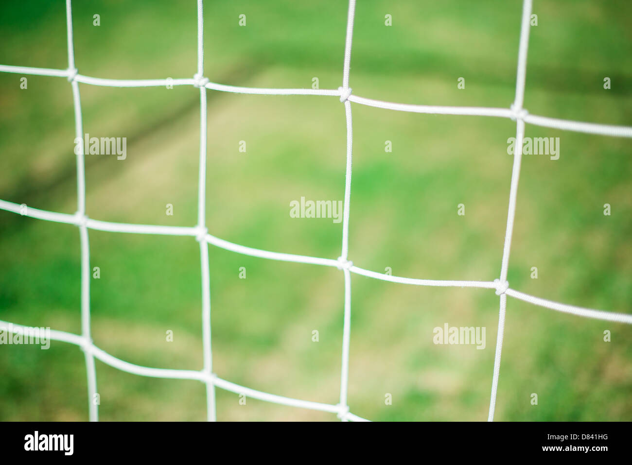 Fußball Netto und grasgrün Hintergrund Stockfoto