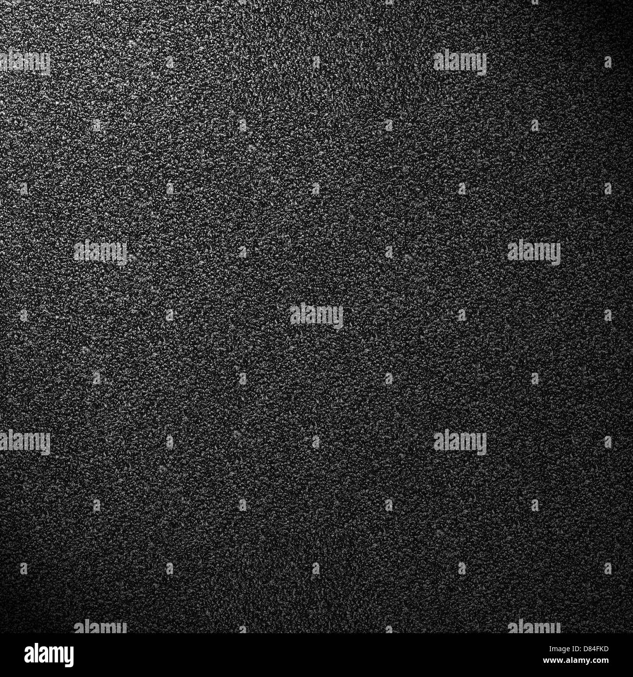 schwarzen abstrakten Hintergrund, körnig grobe Muster Textur Stockfoto