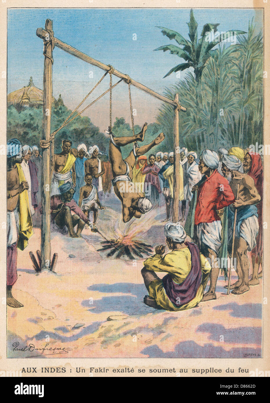 Fakir hängt über einem Feuer, Indien Stockfoto