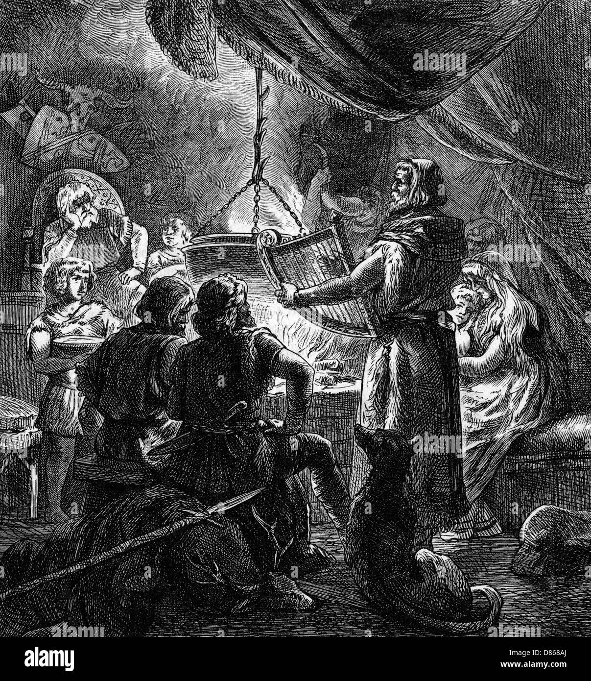 Deutscher Barde singt im mittelalterlichen Saal Stockfoto