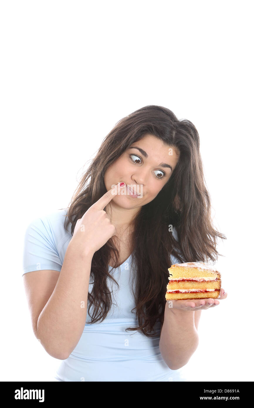 -Modell veröffentlicht. Junge Frau Holding Kuchen Stockfoto