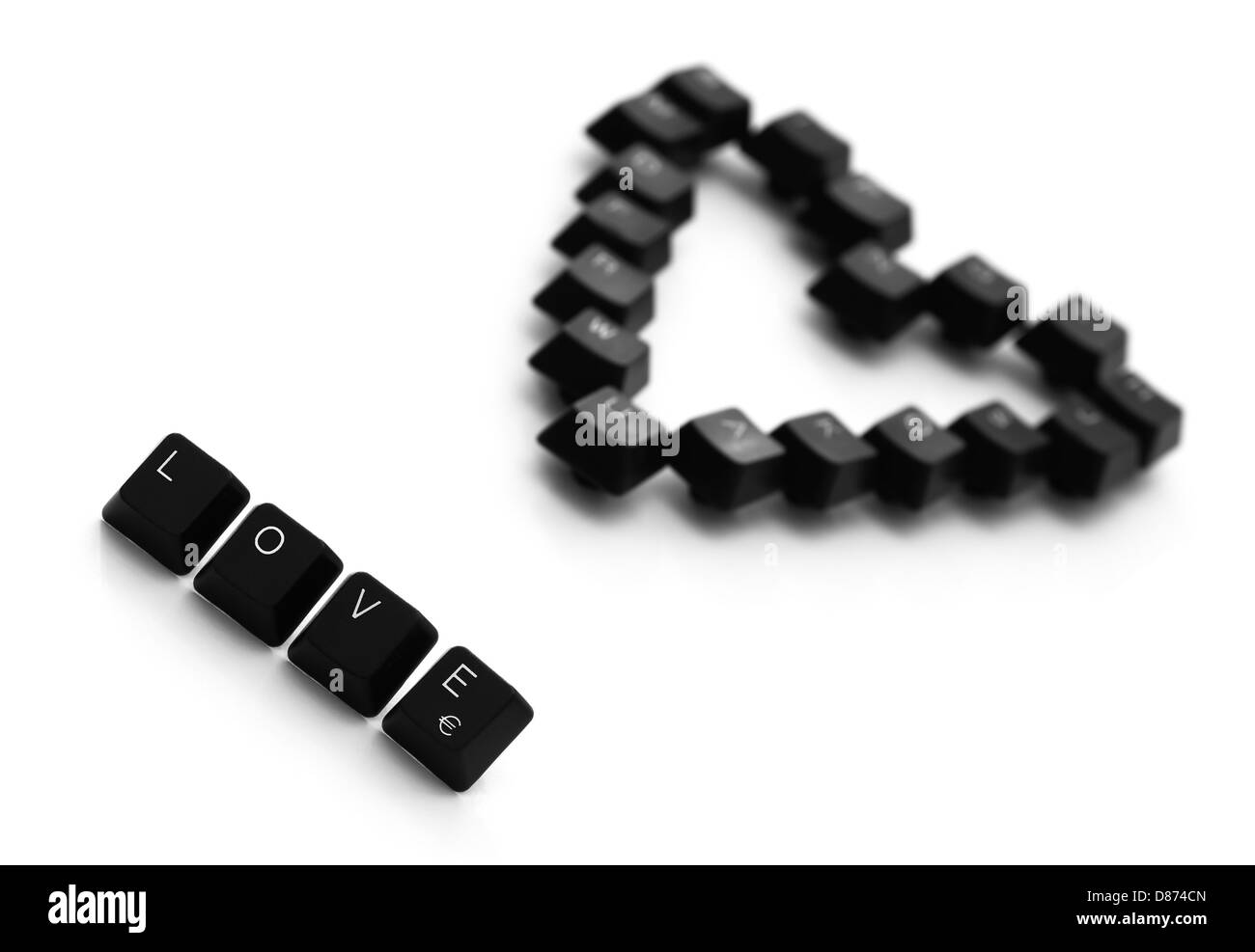 Zeichen der Liebe und Herz gemacht der Tasten der Tastatur auf einem weißen  Hintergrund Stockfotografie - Alamy