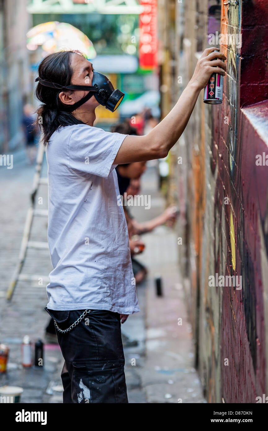 Straßenkünstler schmücken die Wände von Melbournes Hosier & Rutledge Lanes mit Wandmalereien, die eine beliebte Touristenattraktion darstellen. Stockfoto