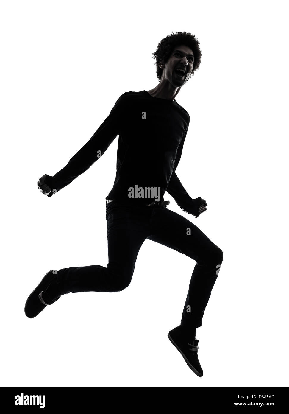 eine afrikanische hübscher junger Mann springen schreiend in Silhouette Studio isoliert auf weißem Hintergrund Stockfoto