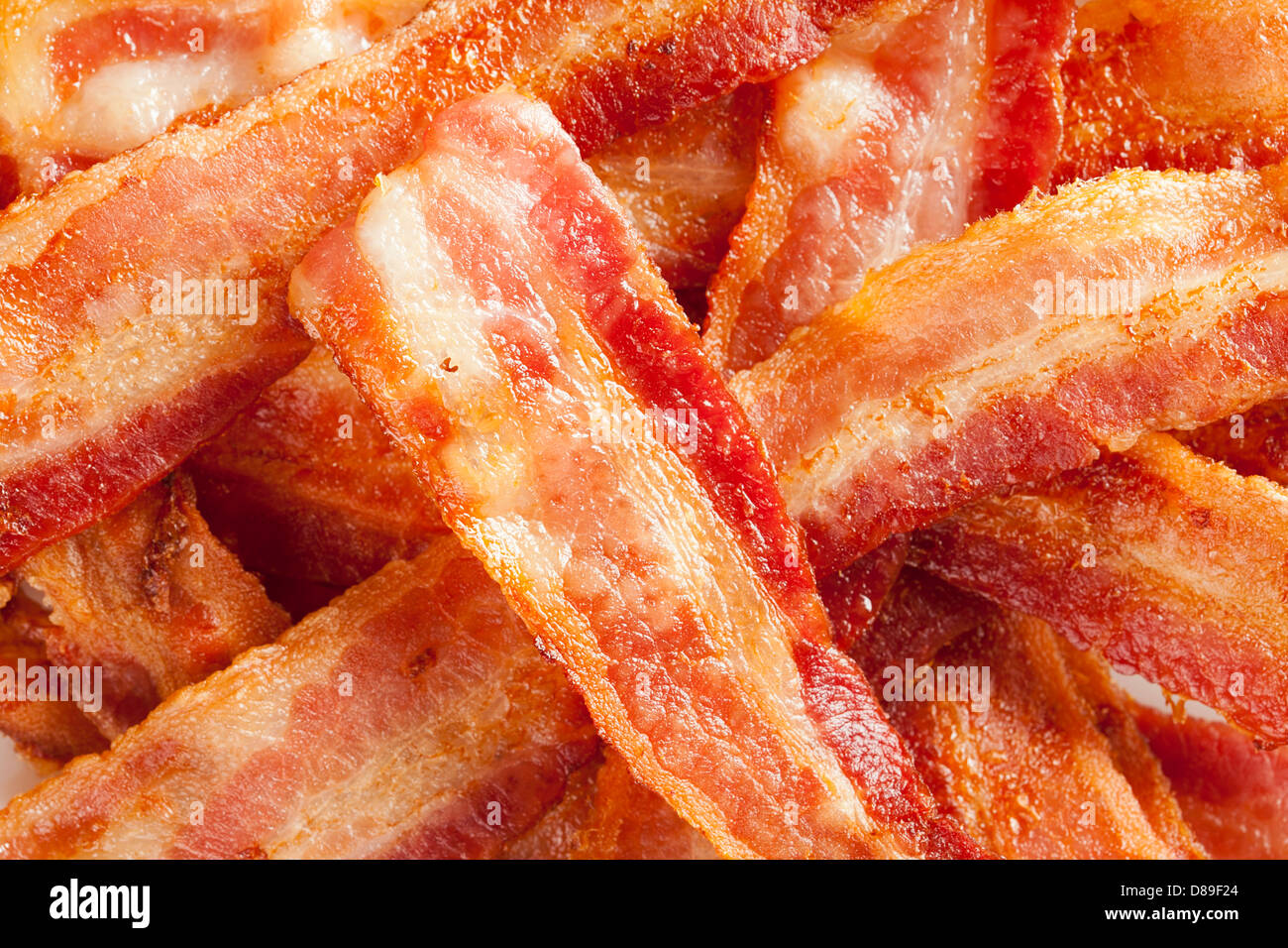 Gekochte fettigen Speck gegen einen Hintergrund Stockfoto