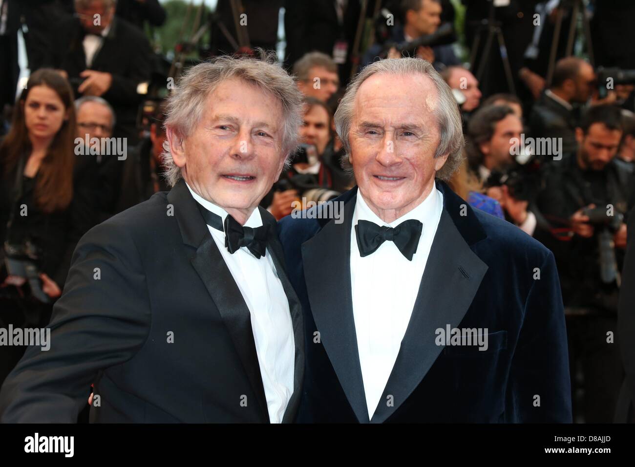 Cannes, Frankreich. 22. Mai 2013. Britische ehemalige Formel-1-Fahrer Jackie Stewart und Regisseur Roman Polanski (l) teilnehmen die Premiere von "Weekend Of Champions" während der 66. Internationalen Filmfestspiele von Cannes am Palais des Festivals in Cannes, Frankreich, am 22. Mai 2013. Foto: Hubert Boesl/Dpa/Alamy Live News Stockfoto