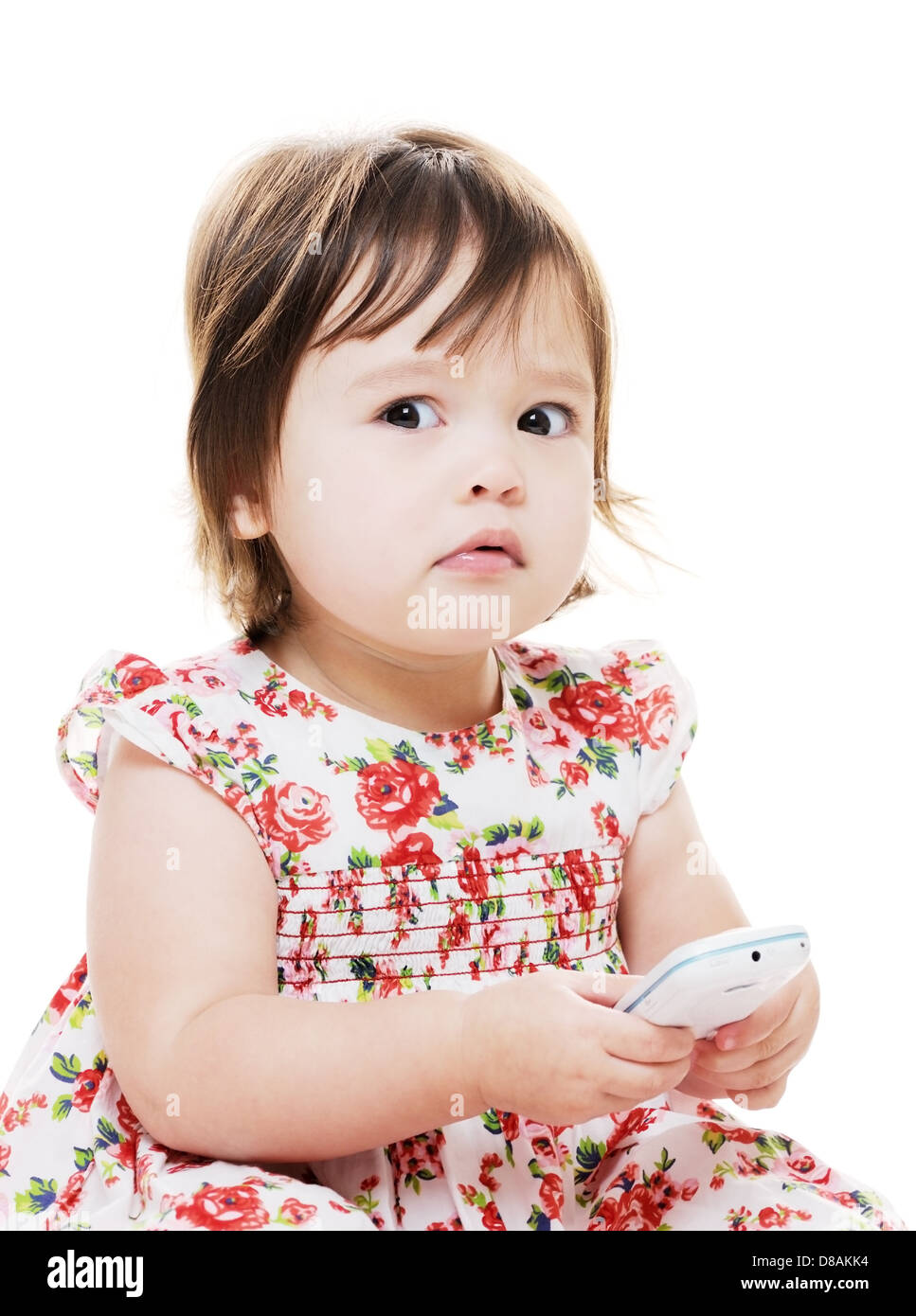kleine Mädchen SMS auf Handy falsch sieht besorgt Stockfoto