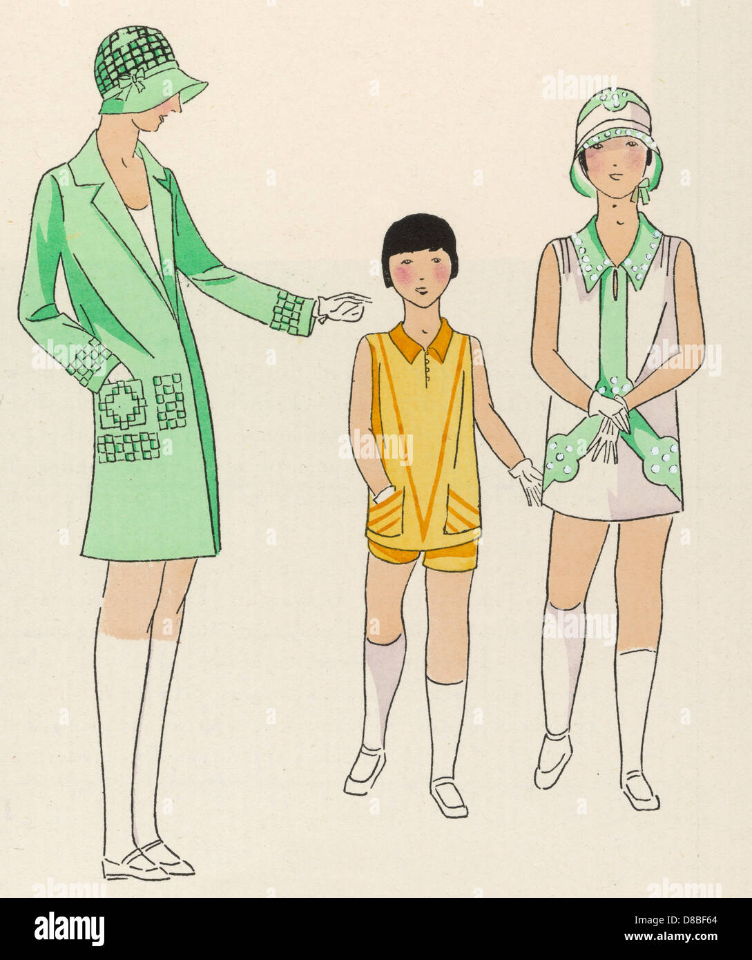Drei Kinder in Outfits von Mignapouf Stockfoto