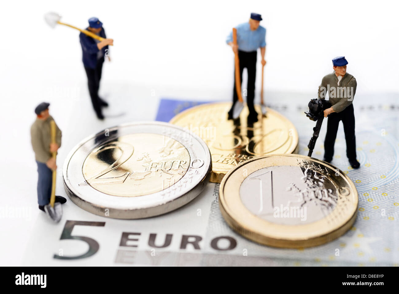 Euro Münzen und Arbeitnehmer Symbolfoto 8,50 Euro Mindestlohn Stockfoto