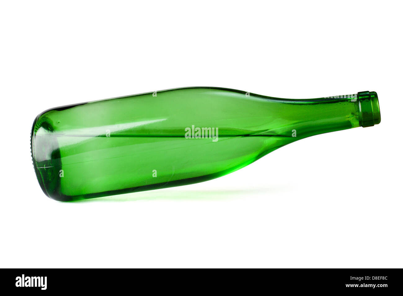 grüne Ranke Flasche gekippt Stockfoto