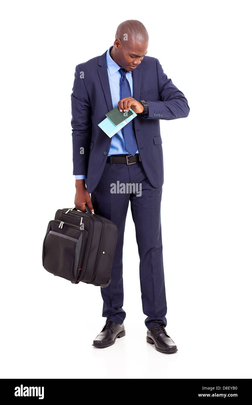 afrikanische amerikanische Geschäftsreisende Flugzeit überprüfen Stockfoto