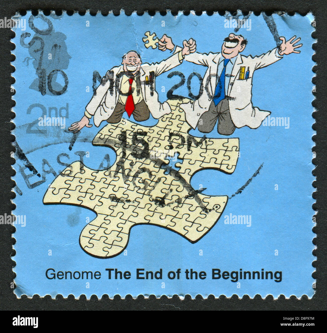 UK - CIRCA 2003: Eine Briefmarke in UK zeigt Bild von profiliert das Genom Puzzle, 50. Jahrestag der Entdeckung der DNA, circa 2003 gedruckt. Stockfoto