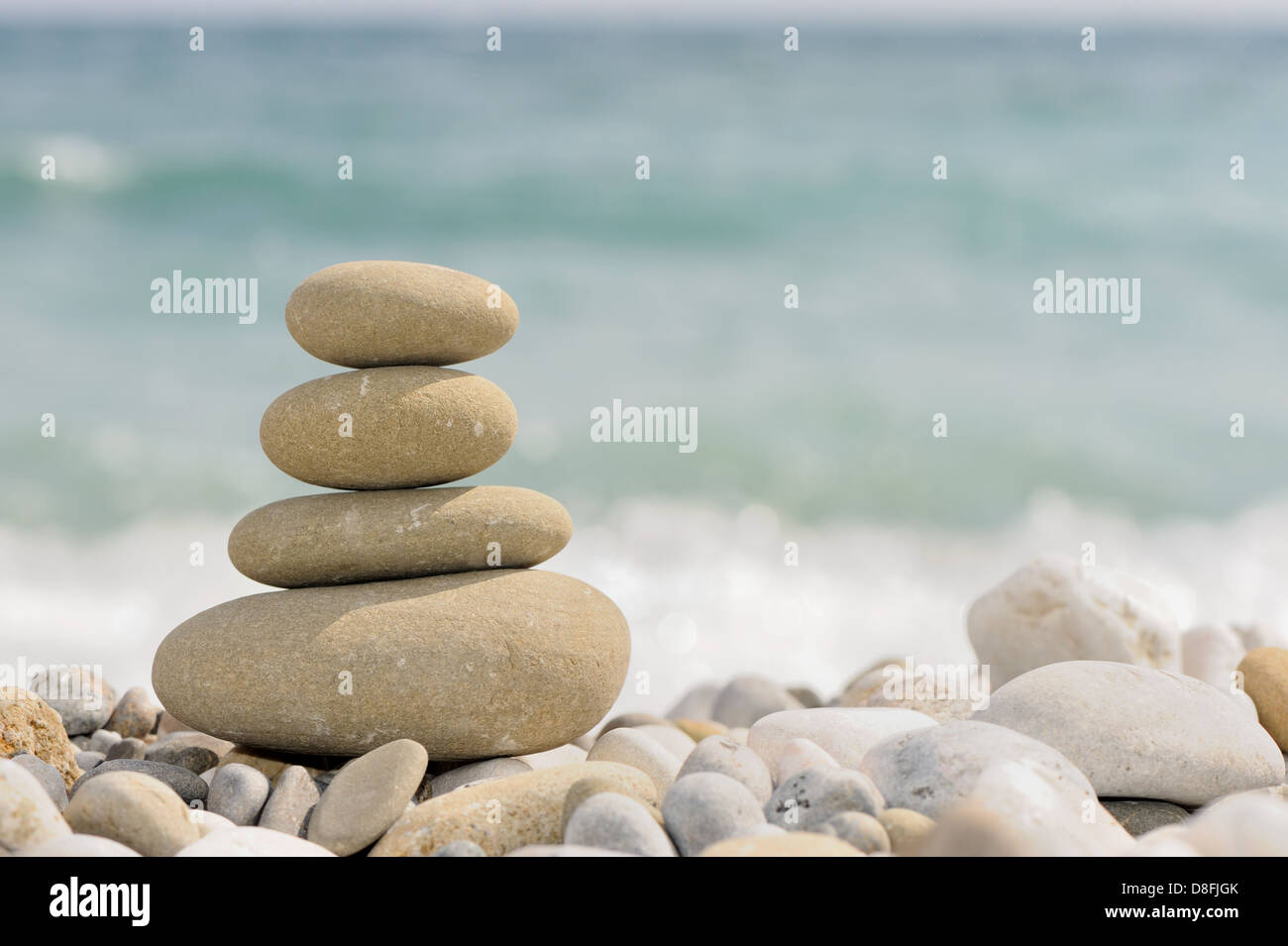 Kiesel am Strand Stockfoto