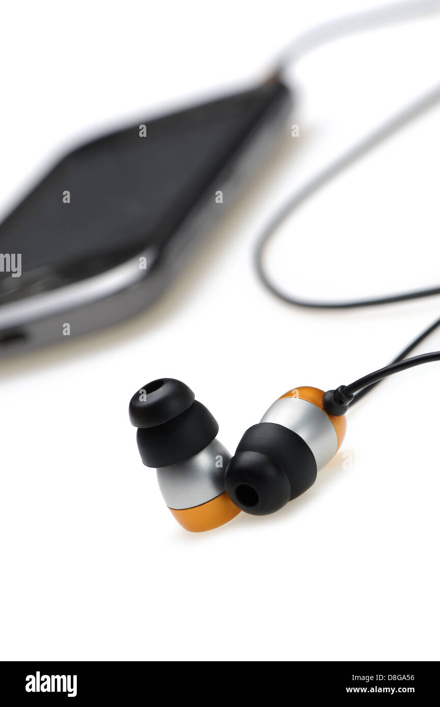 in Ear Kopfhörer mit mobilen audio-player Stockfoto