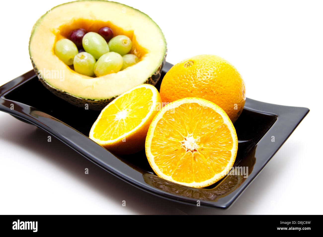 Orange und Melone Stockfoto